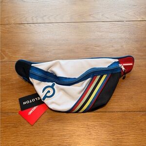 Peloton Crossbody Bag in Blue, Red, and Yellow